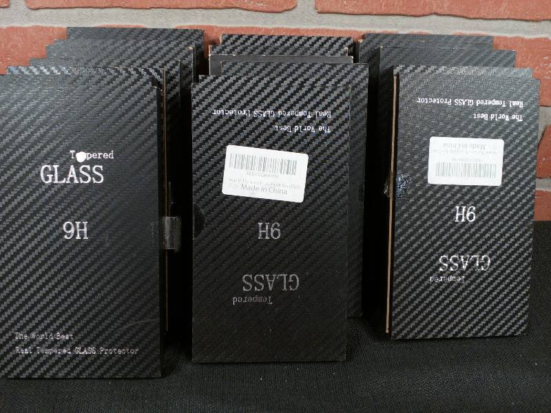 lot 299 image: The World Best Real Tempered Glass Protector 9H Anti-Scratch - Fits a Variety of Phones - Mainly 6S &  6S Plus