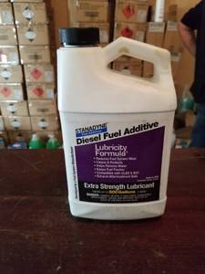 lot 12358 image: BALDWIN FILTERS STANADYNE 38561P DIESEL FUEL ADDITIVE 64OZ. BOTTLE GRAVITY 0.77