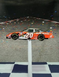 lot 37203 image: Toney Stewart #20 The Home Depot The Victory Lap, 2003 Monte Carlo, 1 of 588 pn 105392, 124 Diecast scale stock car, Limited Edition Collectable