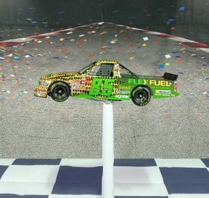 lot 37216 image: Dennis Setzer #85 Flex Fuel, 2006 Sliverado Super Truck Color Chrome, motorsports authentics 124 Race Truck, Limited Edition Collectable, 1 of 216 pn 405091