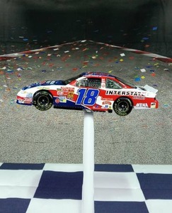 lot 37226 image: Action Bobby Labonte #18 Interstate Batteries Lets Roll, 2002 Grand Prix Die Cast 124, Total Production of 11,158, Mac Tools 1 of 1,798 pn 103318