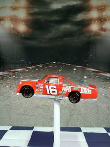 lot 37236 image: Action PLATINUM SERIES Ron Hornaday Jr. 124 Litmited Edition 1995, 1 of 5,004. Top of the bed on truck used for piggy bank, with small key access on bottom of truck