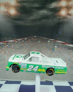 lot 37238 image: Action PLATINUM SERIES 1996 Jack Sprague #24 Collectable, Die Cast 124 Race Truck. 1 of 3,500.Truck Bed piggy bank with small key access under truck