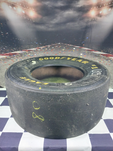 lot 37343 image: Tire purchased from Gateway Raceway in 2001. Came off one of the trucks. It was race used hence no good markings to possibly confirm which truck.
