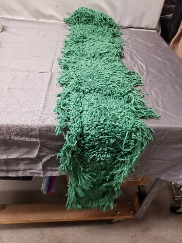 lot 81054 image: Cintas 48 Inch Green Fringe Dust Mop Pad