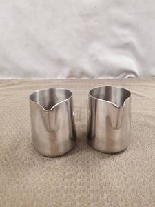 lot 12571 image: (2) Rhino Pro Milk Pitcher