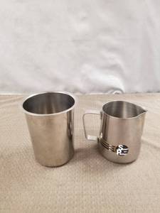 lot 12572 image: MILK PITCHER AND UTENSIL HOLDER