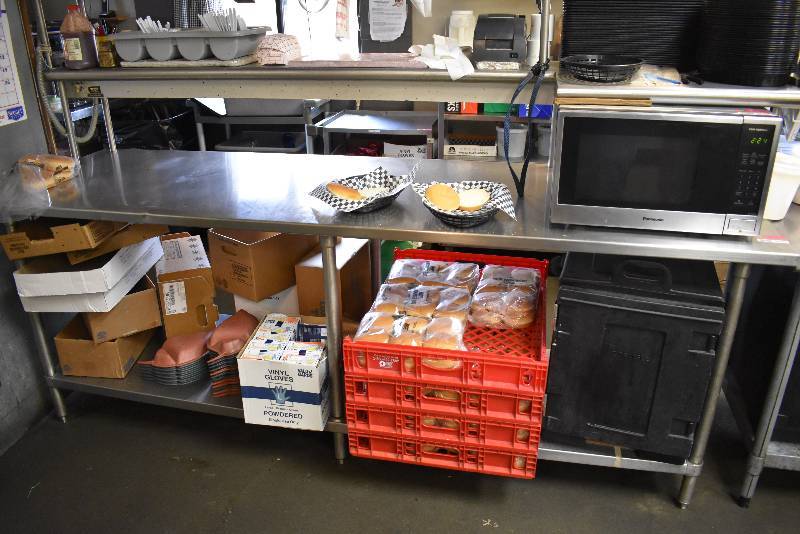 lot 9005 image: Stainless Steel Pass Through Table With Double Overhead Shelf