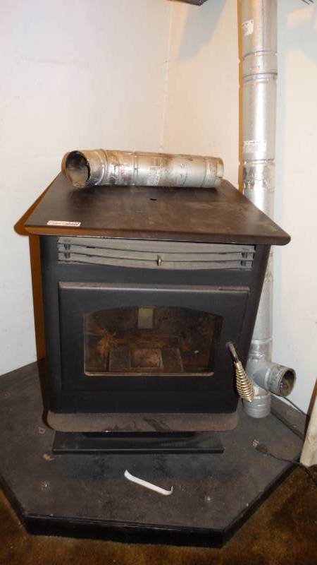 lot 1711 image: Warnock horacy Model P Pellet stove.