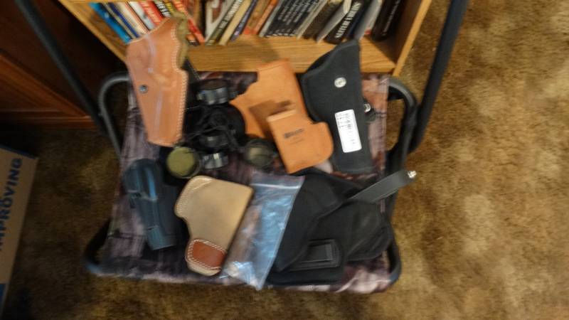 lot 1745 image: Variety of gun holsters.