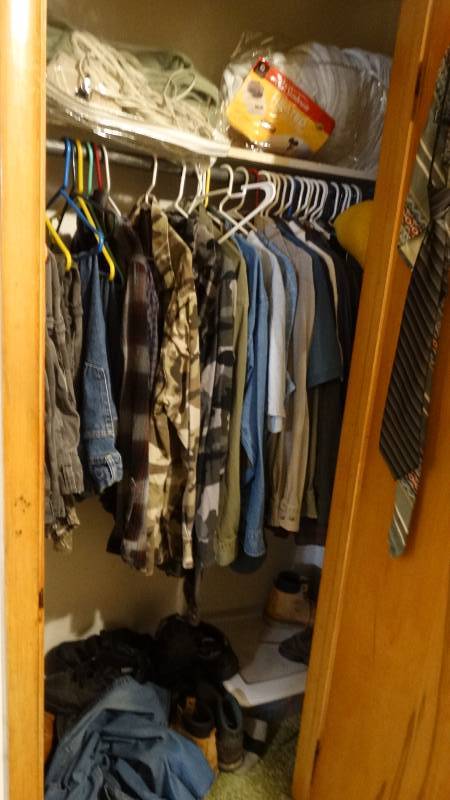 lot 1754 image: Contents of closet- clothes, heating blanket, etc.