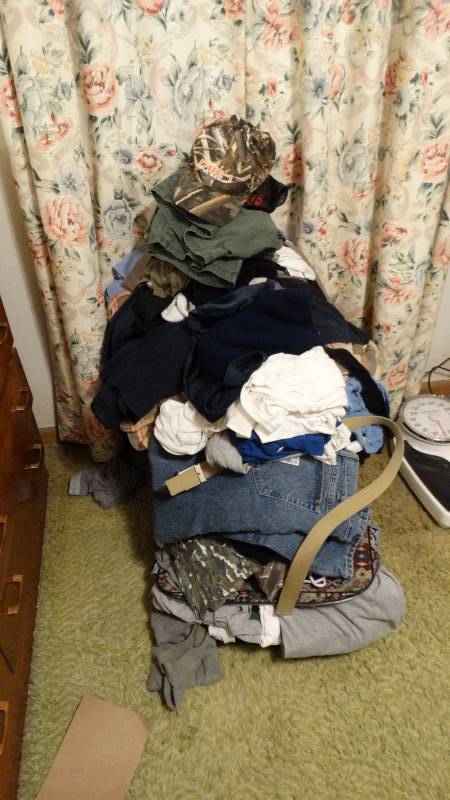 lot 1755 image: Miscellaneous clothes, suit case and laundry basket.
