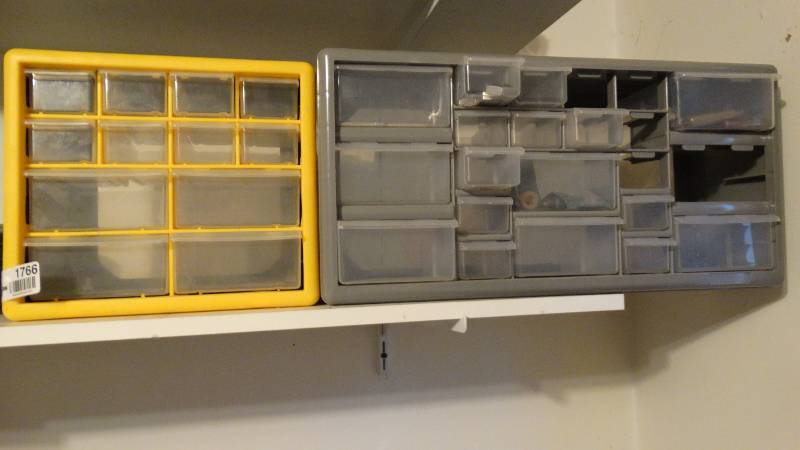 lot 1766 image: 2 Plastic containers with lids and contents.