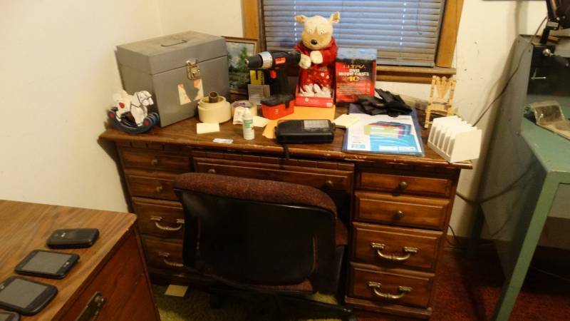 lot 1768 image: Desk and contents with chair.