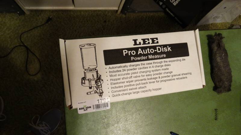lot 1794 image: Lee pro auto disk powder messure and Lee pro auto disk update kit.