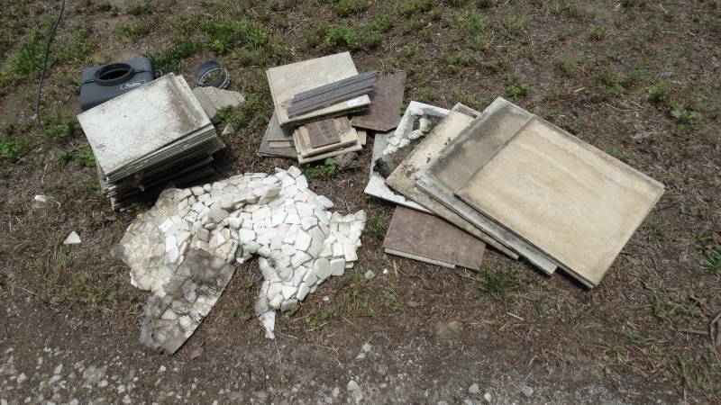 lot 1800 image: Lot of tile and a Aprilaire Model220.