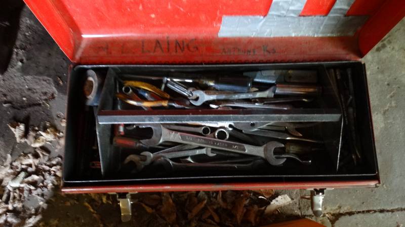 lot 1849 image: Metal tool box with wrenches, screw drivers and sockets.