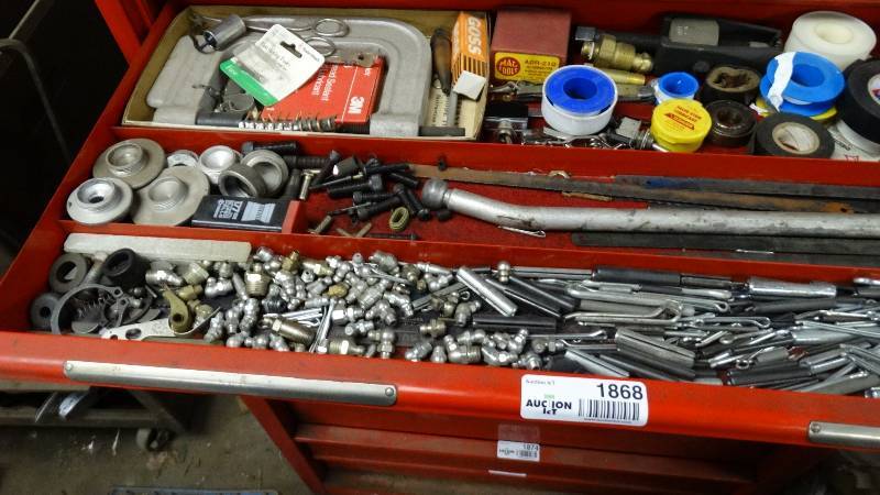 lot 1868 image: A lot of grease serts, saw blades, electrical tape, cotter pins.