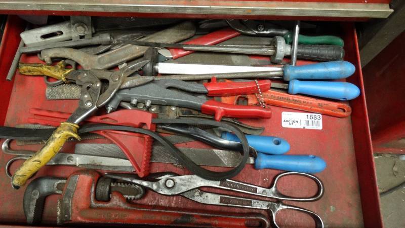 lot 1883 image: Drawer with sheet metal sheers, oil filter wrench, metal files, pipe wrench.