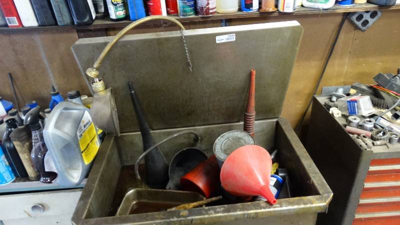lot 1895 image: Parts cleaner with several differnt size funnels.