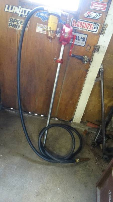 lot 1921 image: Golden rode Manual gas pump.