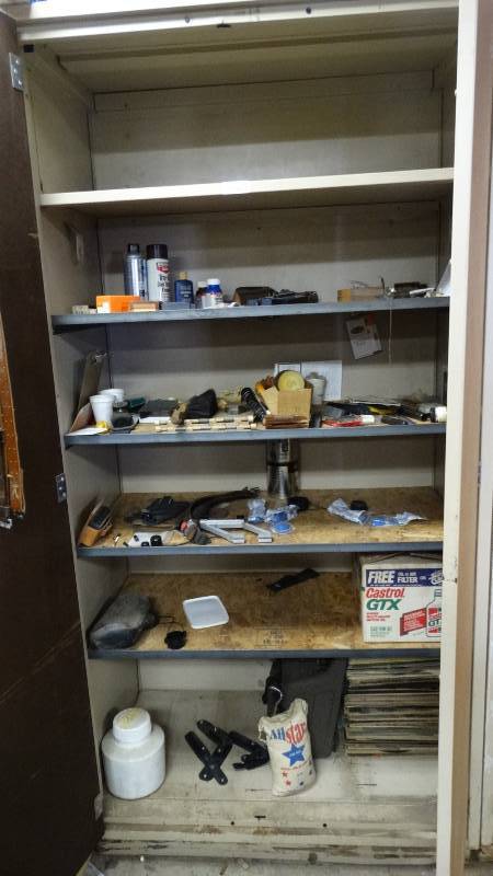 lot 1946 image: Cabinet with contents.