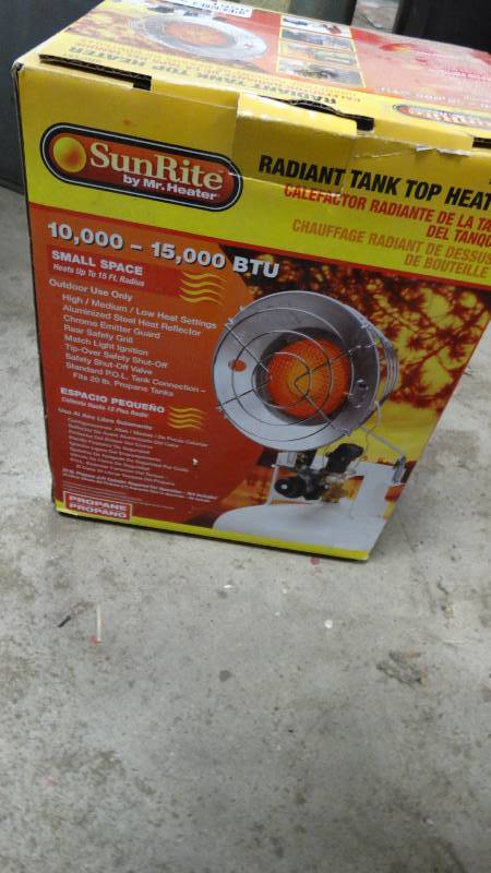 lot 1950 image: Sun- rite by mr. Heater, small space 10,000-15,000 BTU.