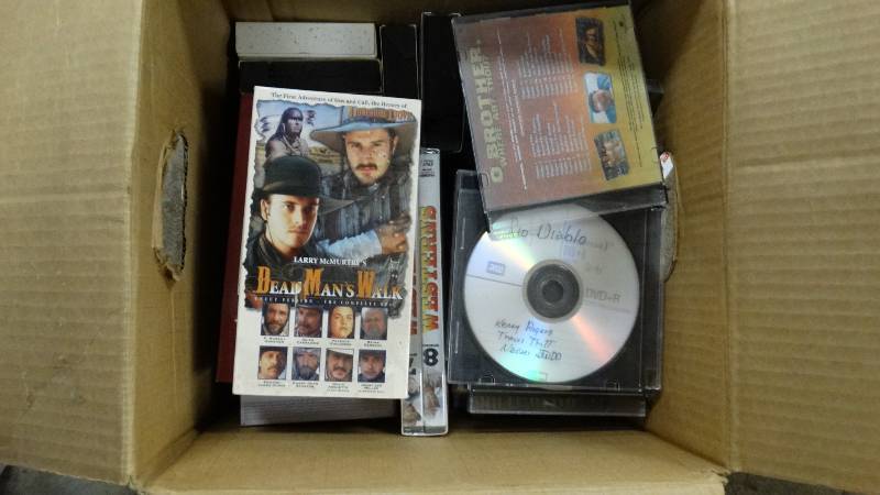 lot 1951 image: VHS tapes, DVD.
