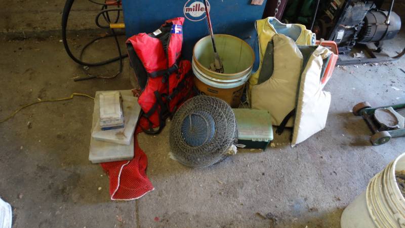 lot 1975 image: Fishing equipment, life vest, bait buckets, tackle boxes and contents.