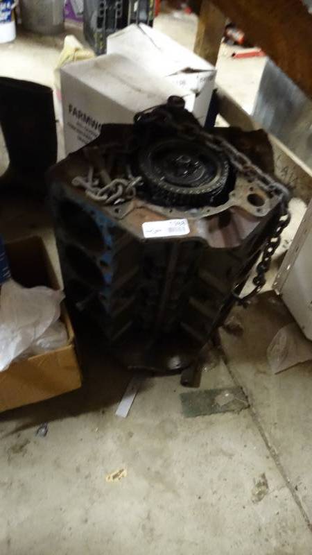 lot 1988 image: Part of a vehicle motor.