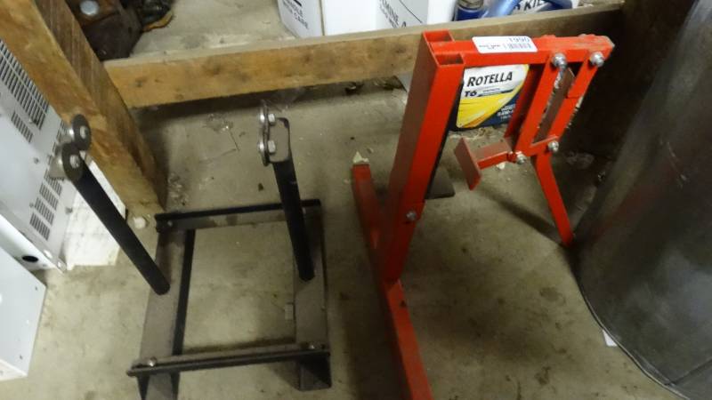 lot 1990 image: Motorcycle bead breaker and a small metal workshop stand.