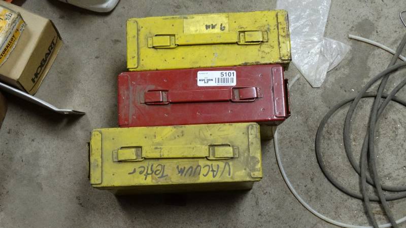 lot 5101 image: 3- metal Ammo cans & vacuum tester & digital tachometer
