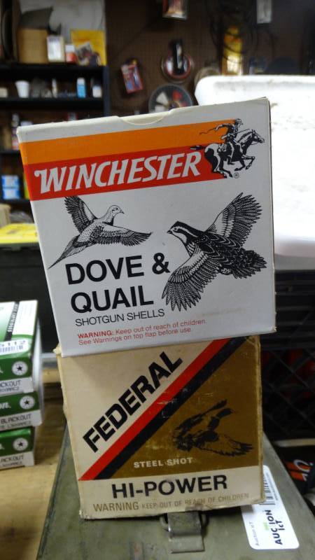 lot 5109 image: 2- boxes of 12 gauge shotgun ammo, 1- box of 16 gauge ammo and 1- box of 20 gauge ammo.