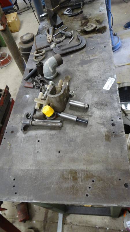 lot 5120 image: Heavy duty metal work bench and 22 C clamps.