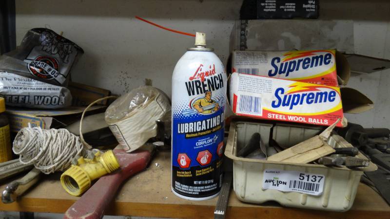 lot 5137 image: Hose repair kits, bug zapper, bungee cords, steel wool.