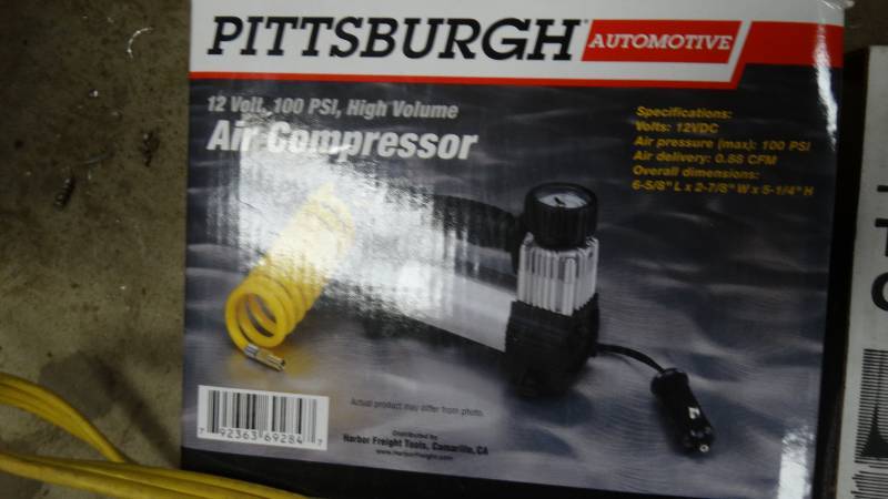 lot 5156 image: Pittsburgh 12 volt air compressor.