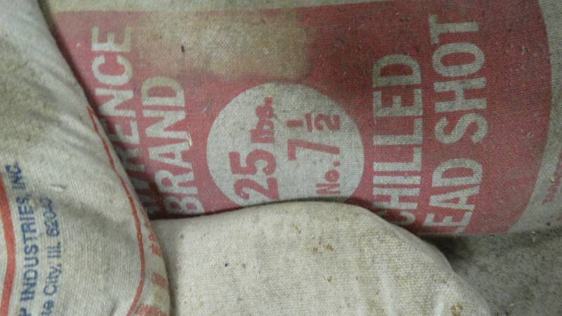 lot 5158 image: 3- full bags and 2- half bags of chill lead shot.