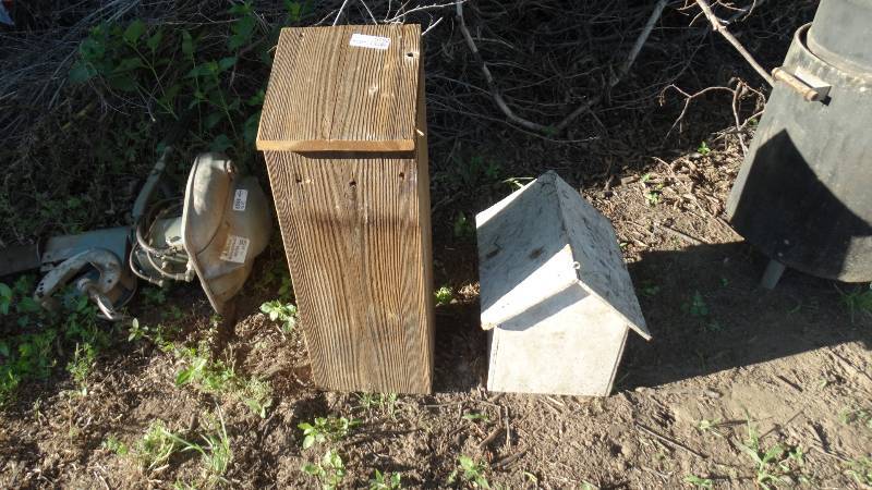 lot 5192 image: A bat house and a bird house.