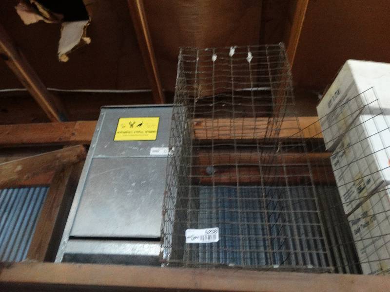 lot 5238 image: Dinner bell animal feeder and animal cage.