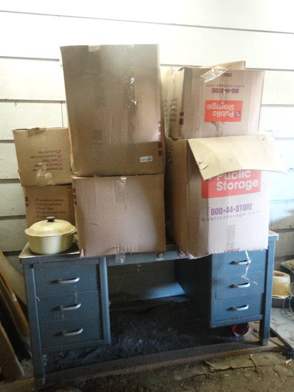lot 5241 image: Old metal desk and boxes of household items.