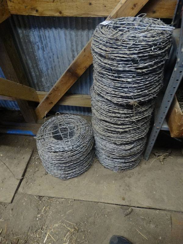 lot 5250 image: 4 rolls of barbed wire.