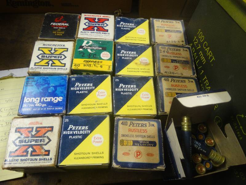 lot 5062 image: 16 boxes of 410 shot gun shells in ammo box. 10- 410 Peters boxes full of shells