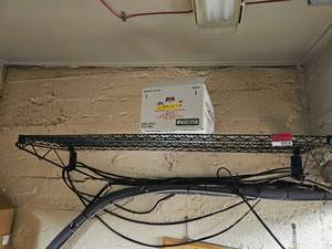 lot 7518 image: Green Wire Wall-Mounted Storage Shelf 60