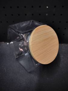 lot 8245 image: Hexagonal Plastic Storage Jar with Bamboo Lid