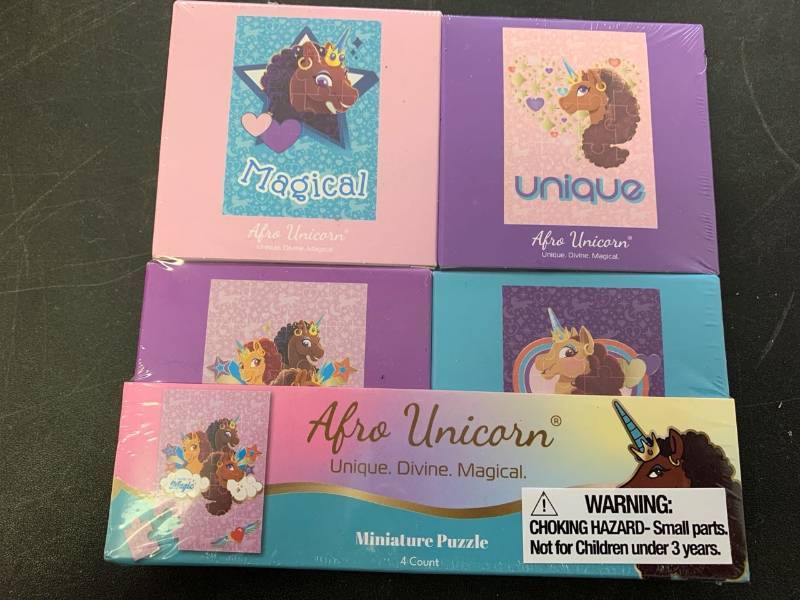 lot 90 image: Afro Unicorn miniature puzzle 4 count assembled puzzle measures 3.5x5 inch