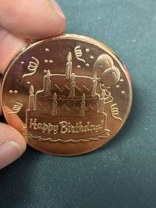 lot 303 image: 1 oz AVDP .999 fine copper round Happy Birthday design
