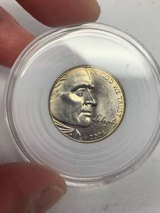 lot 319 image: BU lightly toned in capsule 2005 buffalo nickel 5 cent coin