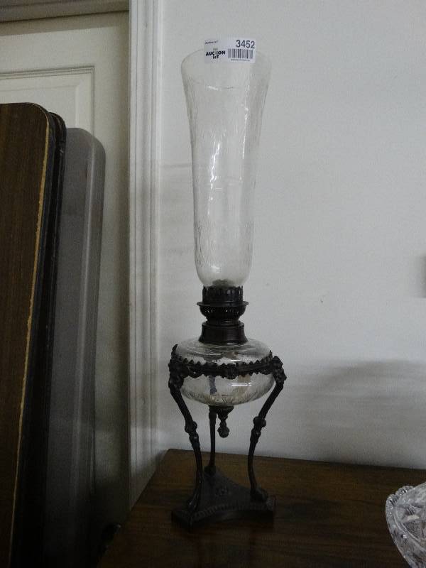 lot 3452 image: Vintage oil lamp on metal stand w globe