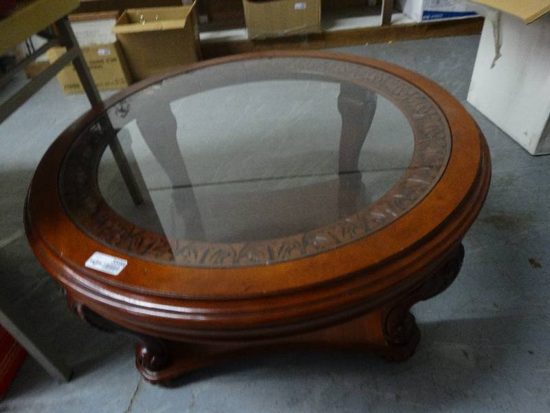 lot 3598 image: Carved Wood Round Coffee Table WGlass Top