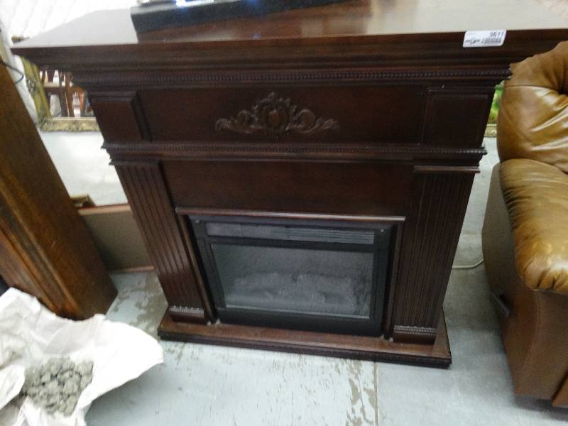 lot 3611 image: Decorative Electric Fireplace.